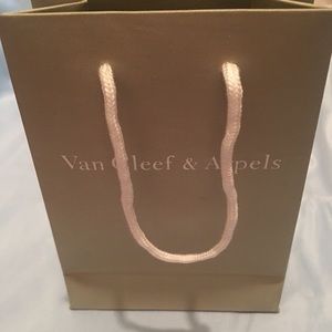 Van Cleef & Arpels bag only.
